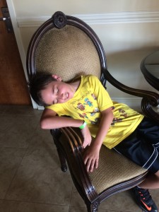 Checking in at Comfort Inn and Suites... kid can sleep ANYWHERE!
